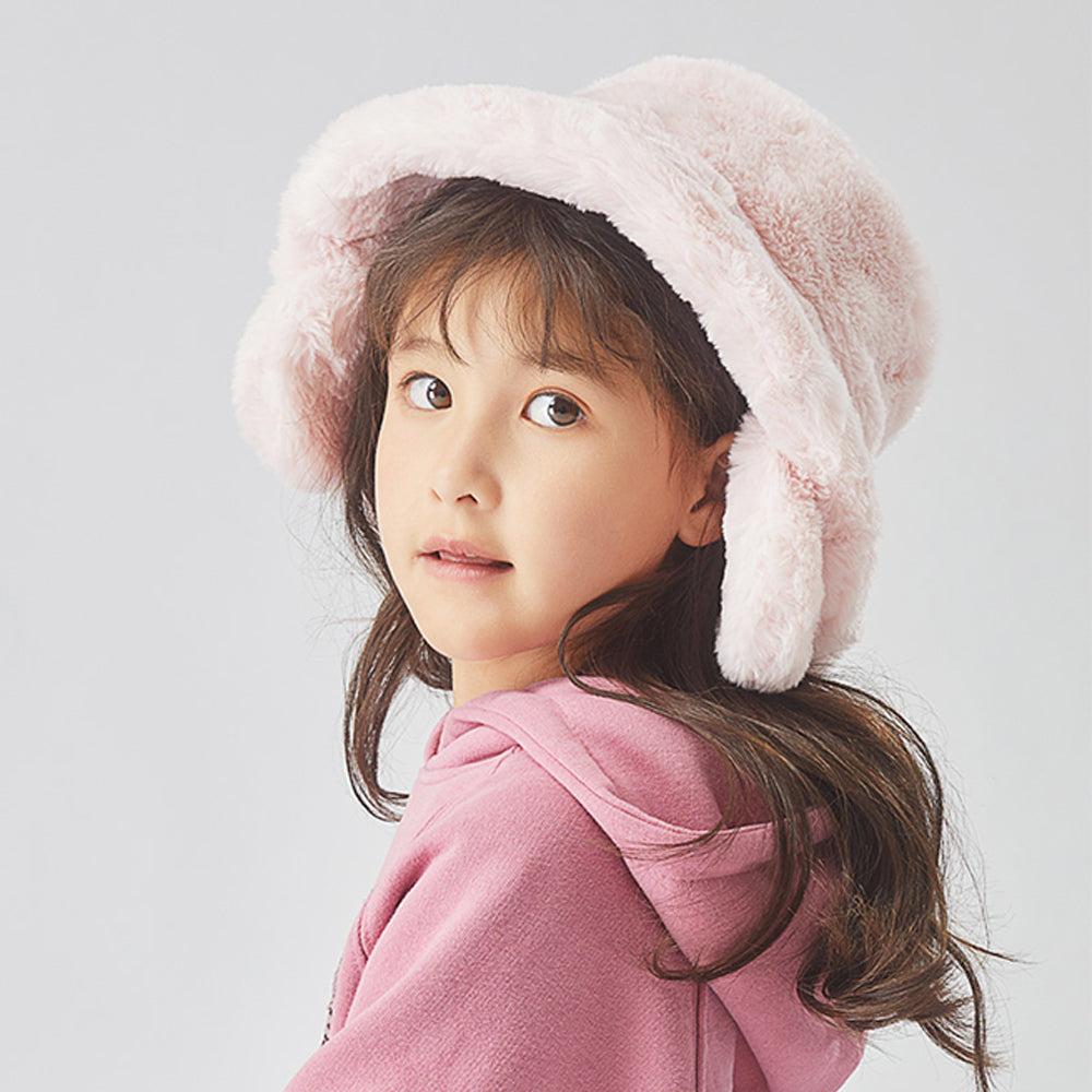 Girl wearing the pink faux-fur hat