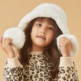 Girl wearing  pink faux-fur hat