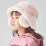 Girl in the pink faux-fur hat